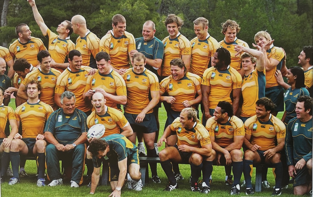 John Connolly pictured with the Wallabies squad, everybody laughing